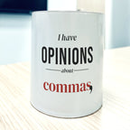 White 11oz mug, front view, printed "I have OPINIONS about commas," with "commas" in brick red and a large black comma.