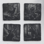 Four square slate coasters engraved with a running buck, a wild turkey, a bull elk and a bear in the forest (product mockup)