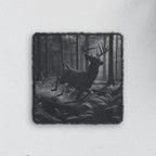 Square slate coaster engraved with a whitetail buck leaping through a misty forest (product mockup)