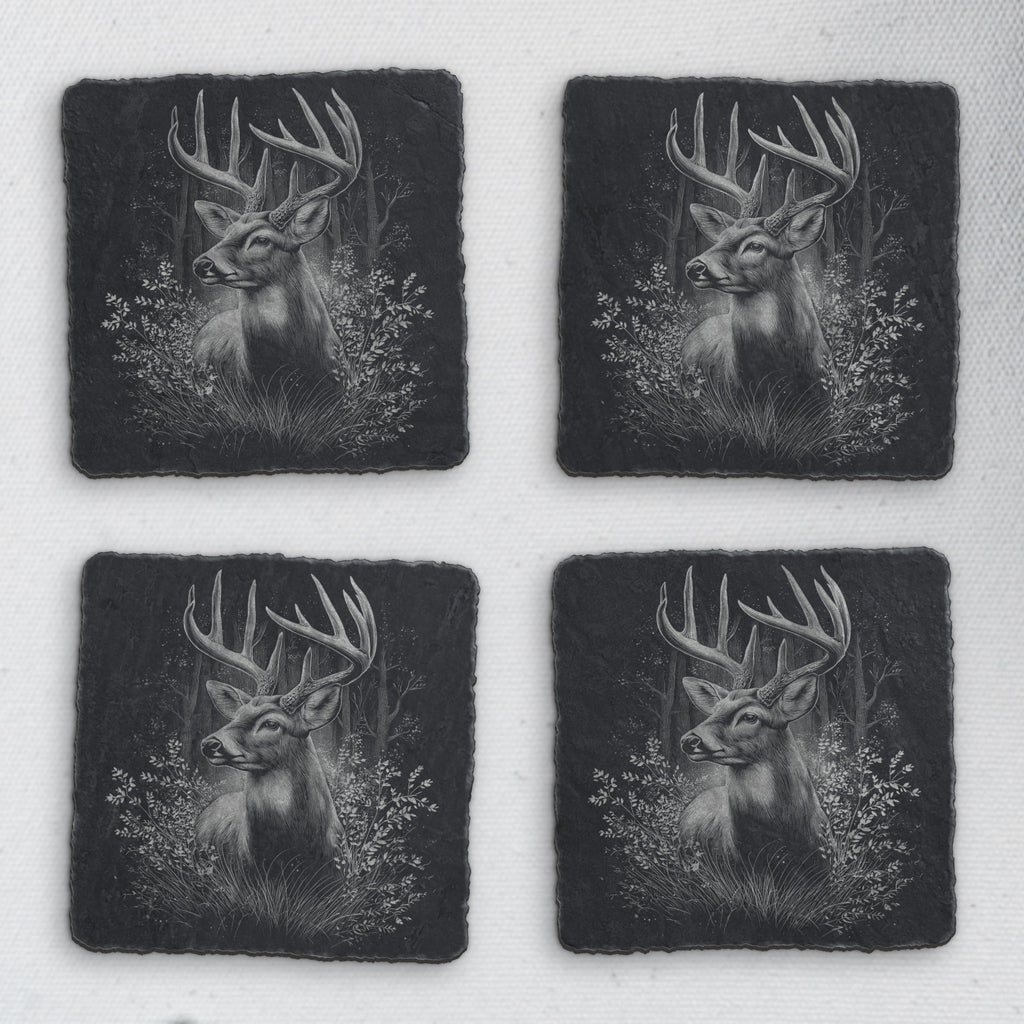 Set of 4 square slate coasters engraved with a whitetail buck in the forest (product mockup)