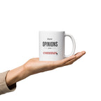White glossy 11oz mug, handle on the right, printed "I have OPINIONS about commas," with "commas" in brick red and a large black comma.